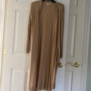 Michelle kors  long jacket with opening on the sizes. Like new